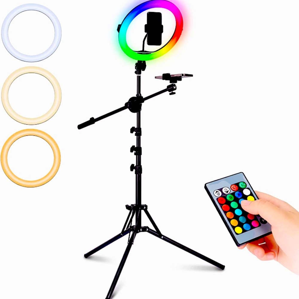 SOLD————.  4 stage adjustable light/phone stand that CHANGES COLORS!! NEVER USED